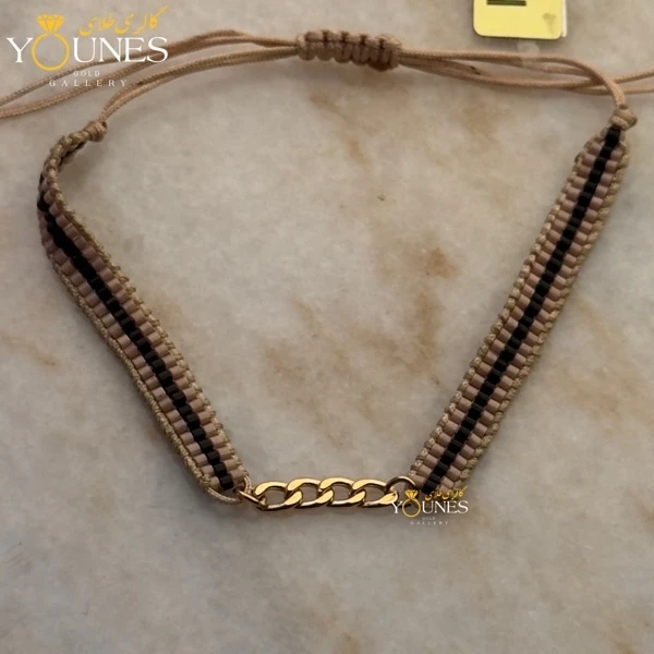 دستبند میوکی کرم خط مشکی کارتیر طلا